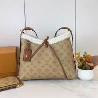 ルイヴィトン ハンドバッグ モノグラムキャンバス ヌメ革ファー縁取り LOUIS VUITTON